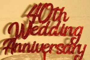 Have your Wedding Anniversary Cake Topper Creatively Designed!
